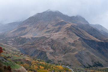 Autumn colors in the mountains as seen from from the small village of Les Cours, near Villar d'Arene and Col du Lautaret, Hautes-Alpes, France