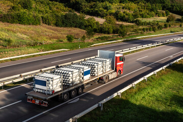 Transportation truck on highway - Mobile gas refueller containers for the transportation of compressed natural gas (CNG)
