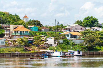 Fototapeta na wymiar Colourful little town on the banks of the Amazon River, Pará State, Brazil