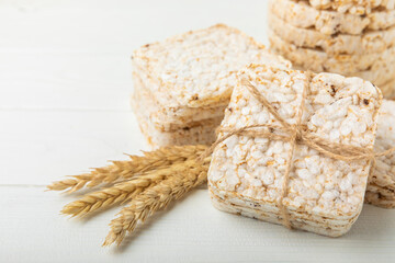 Rice cakes on white texture wood. Close-up. Healthy food. Diet food.Place for text.Space for copy.