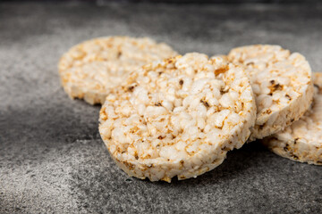Rice cakes on a textured table. Close-up. Healthy food. Diet food.Place for text.Space for copy.