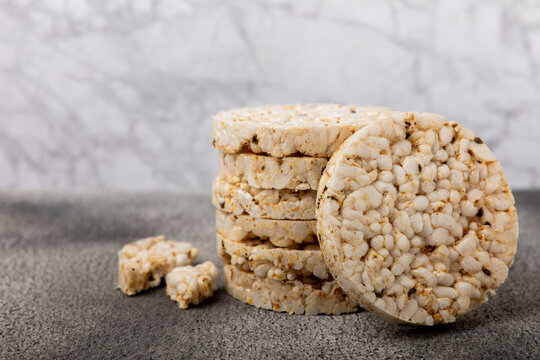 Rice cakes on a textured table. Close-up. Healthy food. Diet food.Place for text.Space for copy.