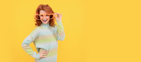 posing for photo. positive emotions. cheerful lady on yellow background. funny redhead woman. Woman isolated face portrait, banner with copy space.
