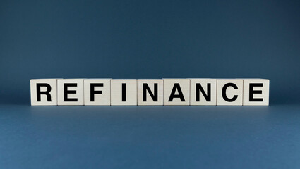 Refinance. Cubes form the word Refinance. Business concept