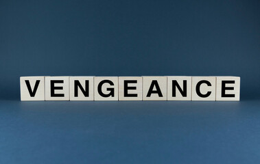 Vengeance. Cubes form the word Vengeance. Vengeance word concept