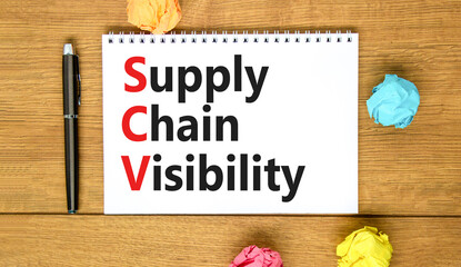 SCV supply chain visibility symbol. Concept words SCV supply chain visibility on white note on a beautiful wooden background. Business SCV supply chain visibility concept. Copy space.