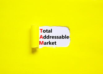 TAM total addressable market symbol. Concept words TAM total addressable market on white paper on a...