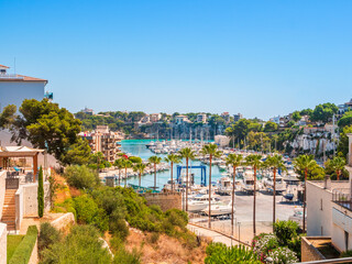 Fototapeta na wymiar Beach harbor and houses of Porto Cristo Mallorca