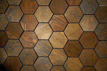 background of wooden cells in the shape of a honeycomb