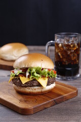 hamburger with glass of soda