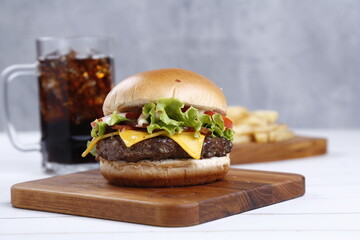 hamburger with glass of soda