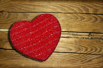 glitter red heart box isolated on wood table 