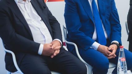 Audience at the conference hall listens to lecturer, people on a congress together listen to...