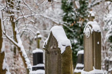old grave yard covered in snow haunted and decaying