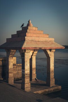 Pigeons Perched on Roof of Hindu Burning Ghat, Somnath Temple, Triveni Mahasangam, Veraval, Gujarat, India
