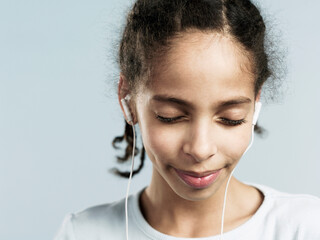 Portrait of Young Girl Wearing Headphones