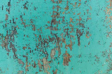 Old shabby green wood. Background, texture.Turquoise old paint on a rustic background