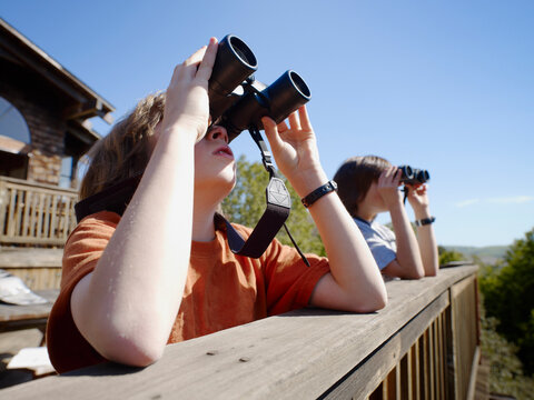 Boys Looking through Binoculars