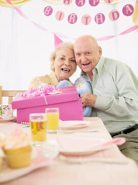 Portrait of Couple at Birthday Party in Retirement Home