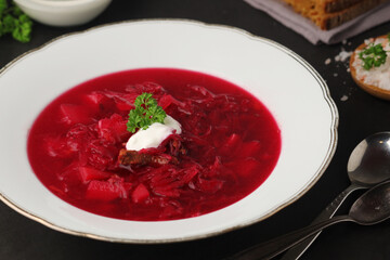 A plate with Ukrainian national dish - borsch