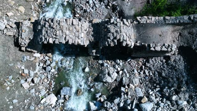 Roman bridge and sunken town of Saqu&eacute;s in the Bubal reservoir. Aerial view from a drone. Jaca Stone. Biescas Municipality. The Jacetania. Huesca, Aragon, Spain, Europe