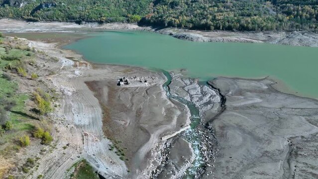 Roman bridge and sunken town of Saqu&eacute;s in the Bubal reservoir. Aerial view from a drone. Jaca Stone. Biescas Municipality. The Jacetania. Huesca, Aragon, Spain, Europe