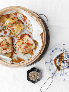 Overhead View of Steamed Cod with Ginger, Soy Sauce and Sesame Seeds, Studio Shot