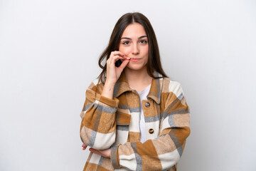 Young girl isolated on white background showing a sign of silence gesture