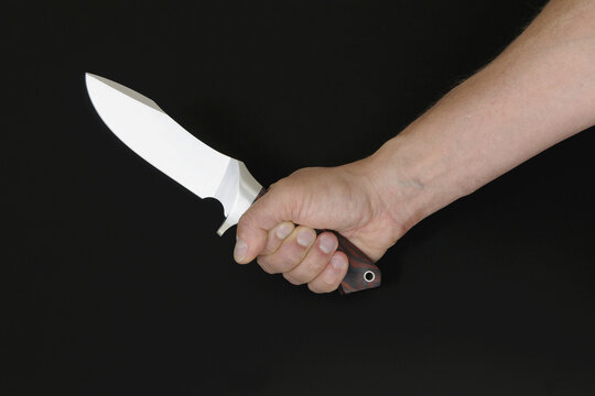 Hand Holding Knife