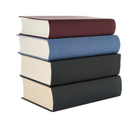 Many different books stacked on white background