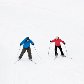 Overhead View of Couple Cross Country Skiing, Whistler, British Columbia, Canada