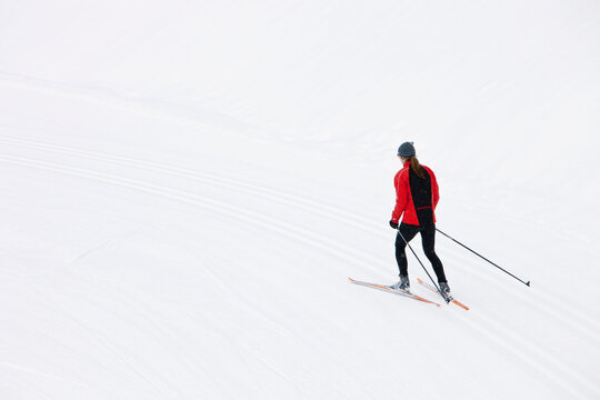 Backview of Woman Cross Country Skiing, Whistler, British Columbia, Canada