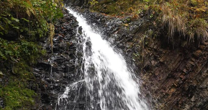 Zhenetskyi Huk or Huk waterfall is located on Zhenets river in Carpathian National Park, Gorgany mountain ridge, near Tatariv village in western Ukraine. Cinema 4K 60fps video