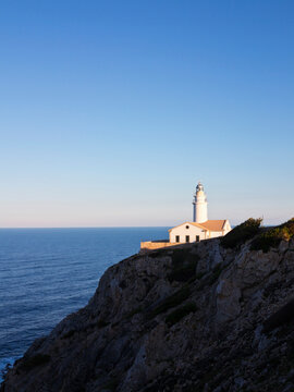 Lighthouse on Coastal Rock at Sunset, Majorca, Balearic Islands, Spain