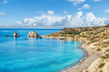Fototapeta na wymiar Landscape with Petra tou Romiou (Aphrodite's beach and rock) in Pafos, Cyprus