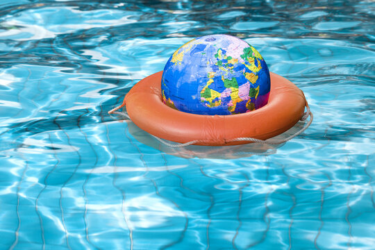 Globe in Life Preserver in Pool