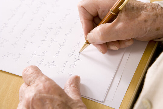 Woman's Hands Writing Letter