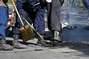 A view of the road construction site. Asphalt paving work.