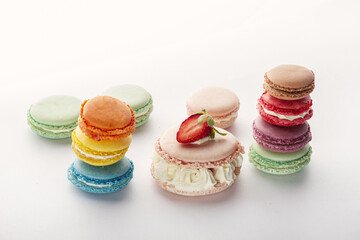 assorted colorful macarons on white  surface 