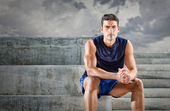 Portrait of Runner sitting on Bleacher Steps, Miami Beach, Florida, USA