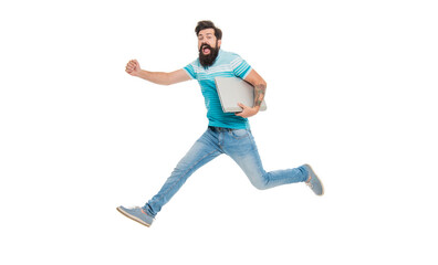 Energetic blogger midair isolated on white. Happy blogger jumping with laptop. Bearded man blogger