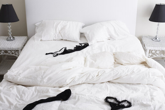 Lingerie on Unmade Bed