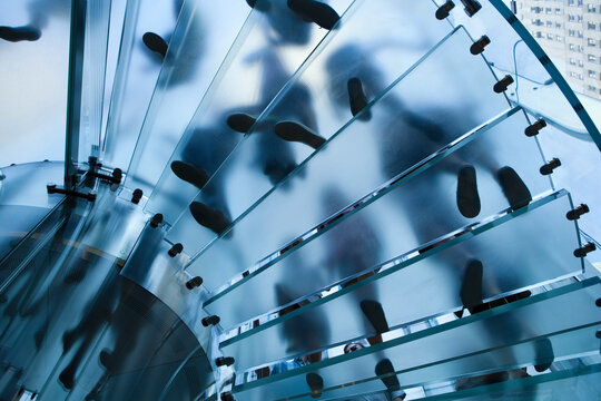 Looking Up at a Glass Staircase in the Apple Store in New York City, New York, USA