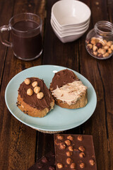Sliced of bread full of chocolate and hazelnut spread