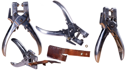 Pliers for making holes in leather, isolated background.