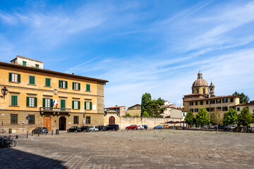 Fototapeta na wymiar Piazza del Carmine square in San Frediano quarter, Florence, Tuscany, Italy, with the church of Cestello in the background.