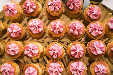 cupcakes in a basket at a celebration, celebrating a birthday