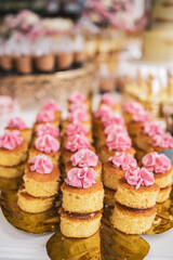 cupcakes in a basket at a celebration, celebrating a birthday, vertical
