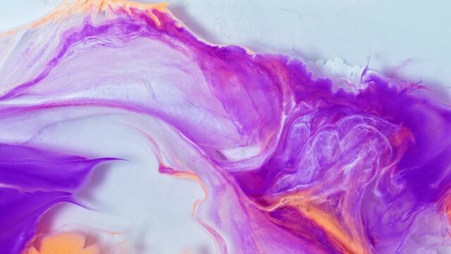 Fluid art drawing footage, abstract acrylic texture with flowing effect. Liquid paint mixing backdrop with splash and swirl. Artistic background motion with overflowing light colors.