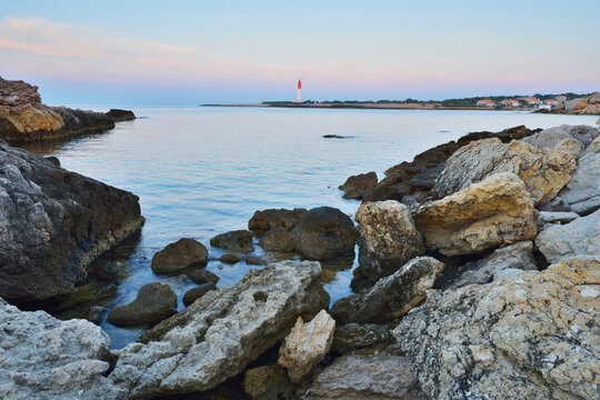 Rocky Coast at Morning with Lighthouse, Anse de la Beaunderie, La Couronne, Martigues, Cote Bleue, Mediterranean Sea, Bouches-du-Rhone, Provence-Alpes-Cote d'Azur, France